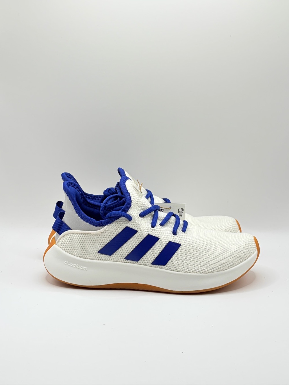 adidas Cloudfoam Pure White Sneakers with Blue Stripes and Orange Soles